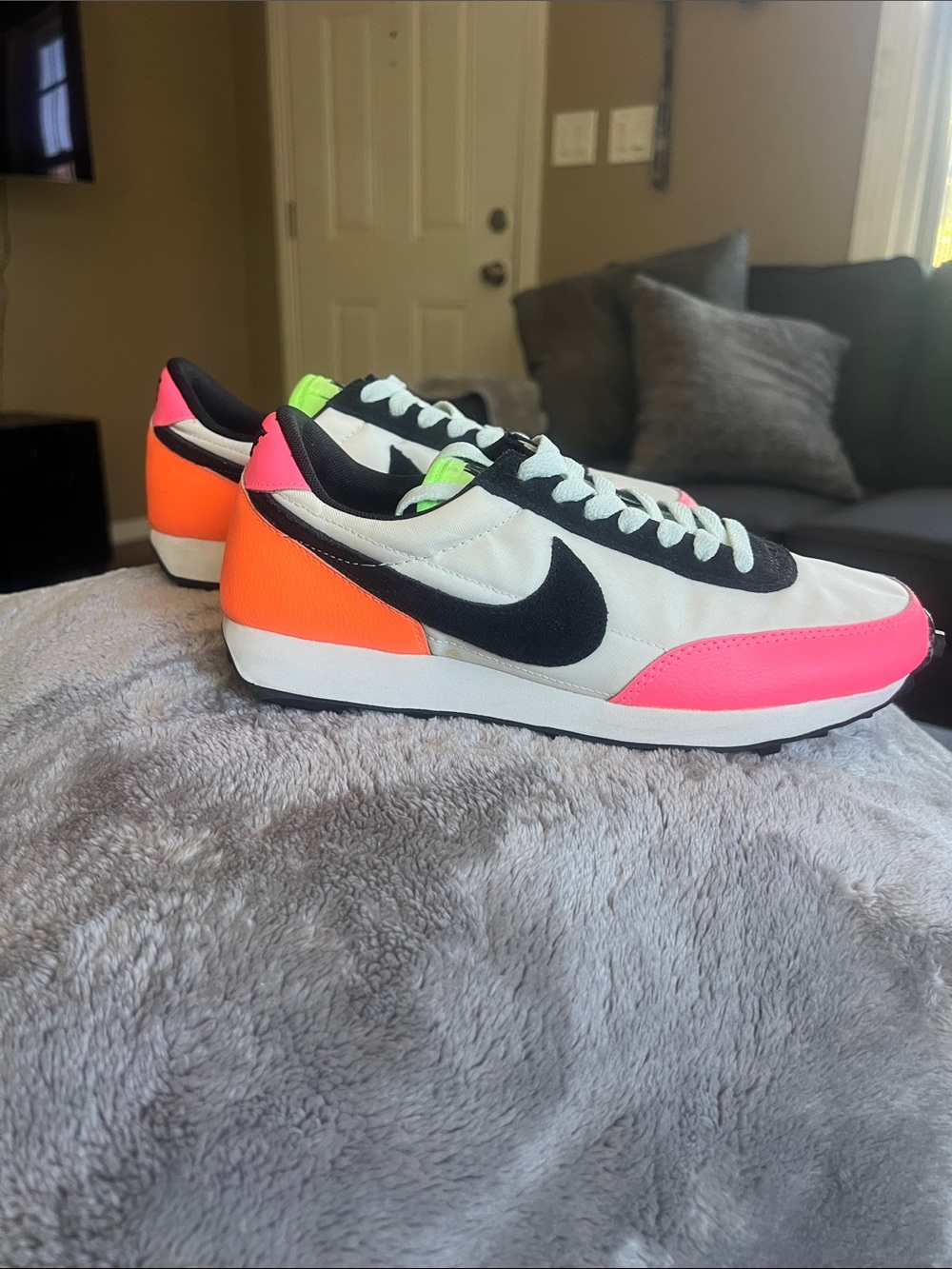 Nike women’s Sneakers in White, Pink & Orange with Black Swoosh